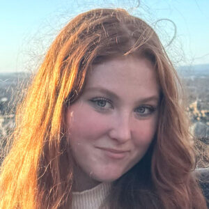 Headshot of a young girl outside