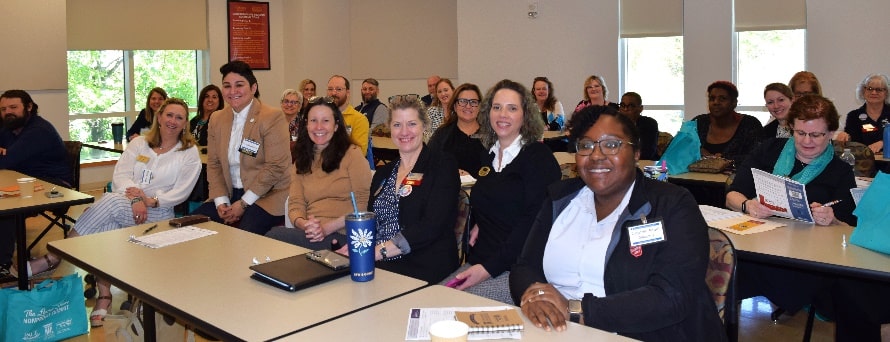 Large group of people in a classroom