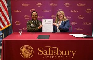 President of Salisbury University with female National Guard