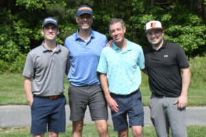 The Bank of Ocean City team, from left, Hank Fisher, Scott Edmonston, Jason Parker and Brandon Tolan, pause for a photo on the course at the Wor-Wic Community College golf tournament held at the college’s Ocean Resorts Golf Club in Berlin.