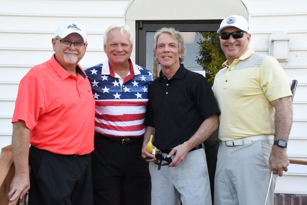 From left, Roger Follebout, Kevin Hayes, John Cannon and Todd Jouischek get ready to hit the greens before the Wor-Wic Community College golf tournament at the Ocean Resorts Golf Club in Berlin.