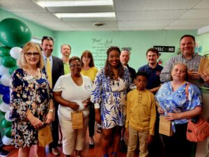 Large group of people standing in a new store