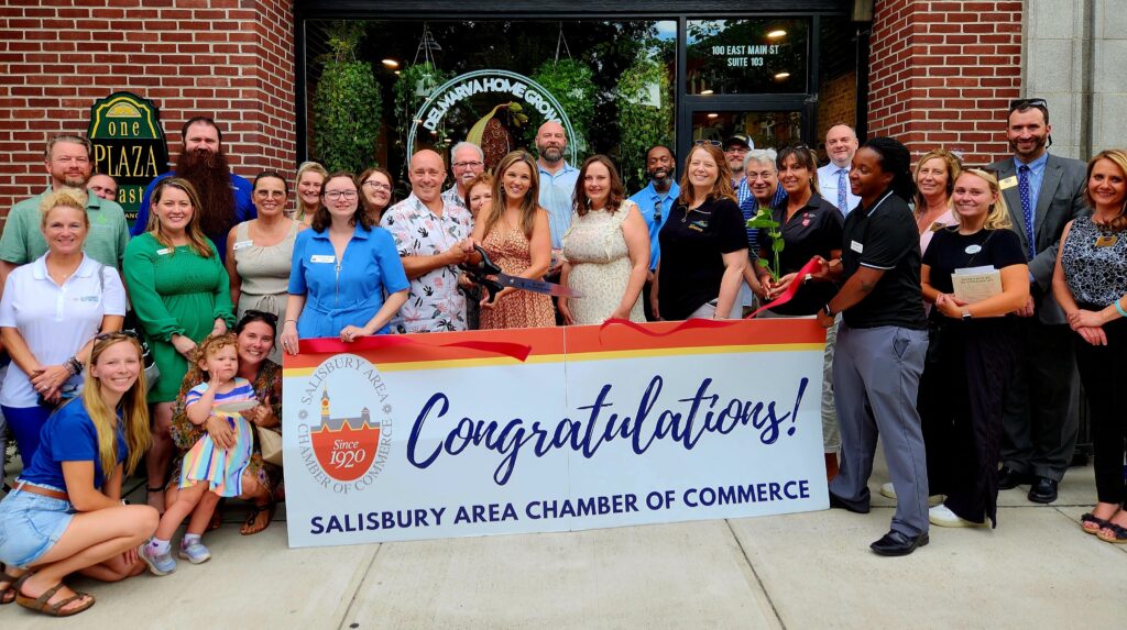 Group of people at a ribbon cutting event in Salisbury, MD