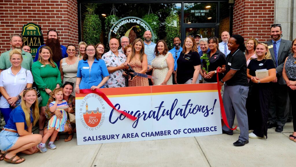 Group of people at a ribbon cutting event in Salisbury, MD