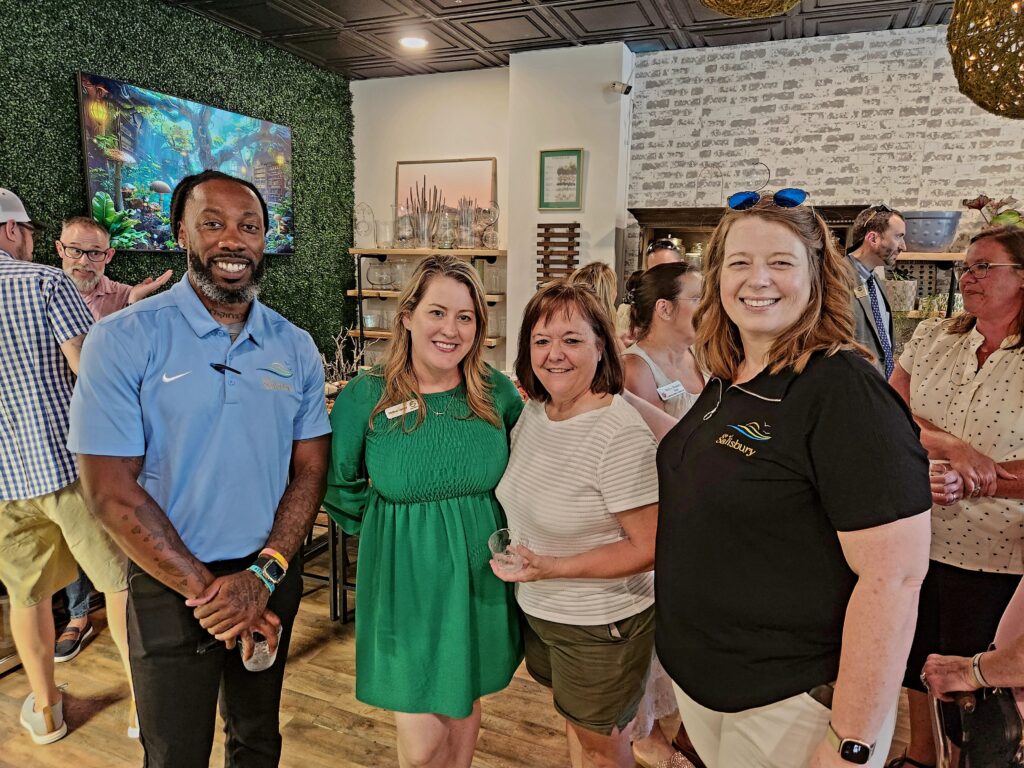 Group of people at a ribbon cutting event in Salisbury, MD