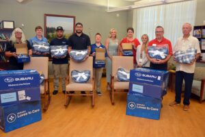 Gateway Subaru and the Leukemia and Lymphoma Society (LLS) Mid-Atlantic Region have again joined forces to donate blankets for TidalHealth’s oncology patients. Pictured from left to right are Teresa Hennessey, Showroom Coordinator, Gateway Subaru; Kyle Reigel, BDC Specialist, Gateway Subaru; Justin Taylor, Parts Specialist, Gateway Subaru; James Harris, Parts Manager, Gateway Subaru; Nanci Townsend, Leasing & Sales Consultant, Gateway Subaru; Heather Turner, Director of Cancer Center Operations, TidalHealth; Teresa Tyndall, Cancer Services Social Worker, TidalHealth; Courtney Miller, Cancer Services Social Worker, TidalHealth; Don Scullen, Sales Manager, Gateway Subaru; and Wayne Richardson, Community Outreach Volunteer, LLS Mid-Atlantic Region.