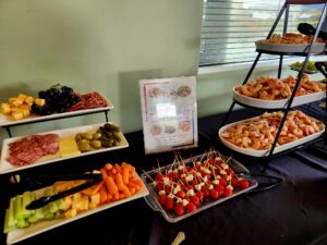 Table display of vegetables and appetizers