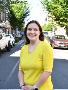 New city of Salisbury employee smiling in the street