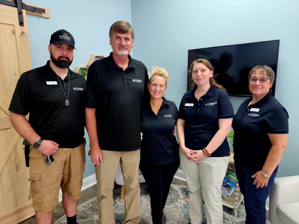 Business owners at the Ribbon cutting celebration for Sunmend in Salisbury, MD