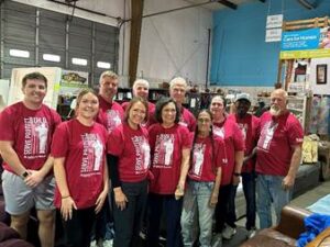 Group of people wearing red shirts