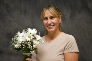 women holding fowers