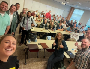 A group of people in a classroom