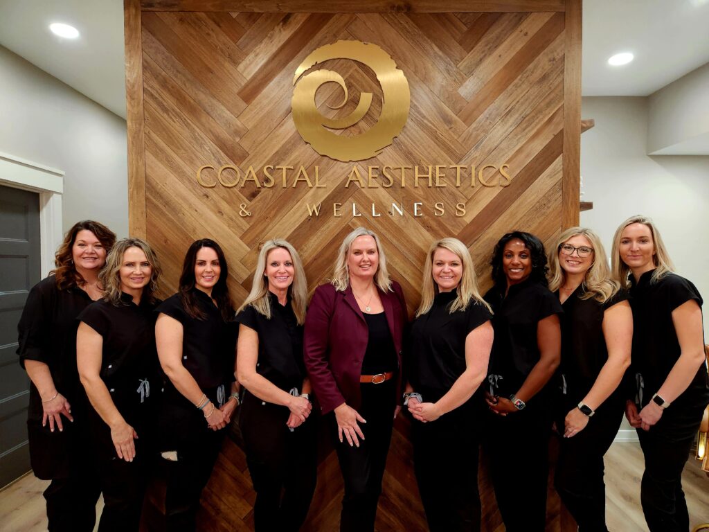 Julie Parish (center), and her talented staff at Coastal Aesthetics and Wellness-min