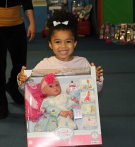 Little girl holding a present