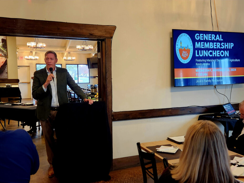 Guest speaker standing at a podium