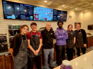 PJ's Coffee Employees standing behind the counter