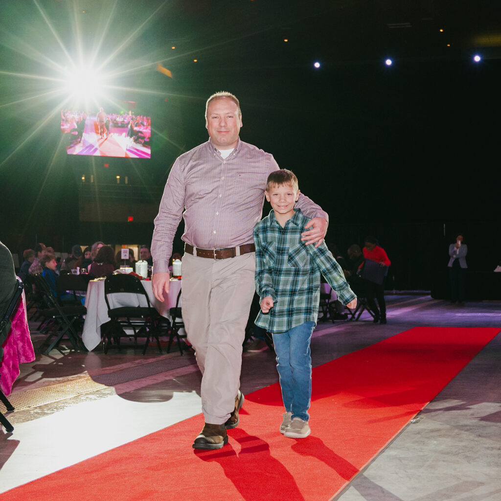 Good Sports Awards Man and Boy walking