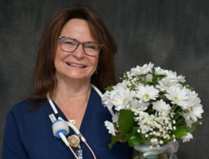 Woman holding daisys