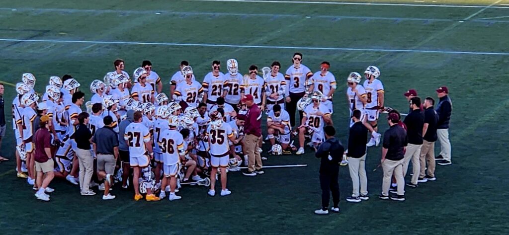 Men's Lacrosse team celebrate winning the game that took place during the Business After Hours