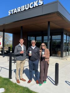 McTeam Starbucks people standing in front of starbucks