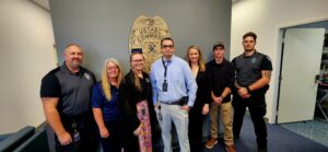 US TASC staff L-R, Jenson Shorter, Sheila Brittingham, MaKenna Shorter, Chief Evan Avnet, Tiffany Schooley, Isaiah Schooley and David Adams