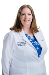 kelly-hearn-krista-min Professional Photo of Woman in Doctor Coat