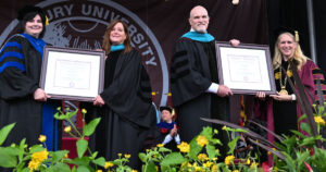 Dan & Stacey Quinn alumni of salisbury university accepting honorary degrees