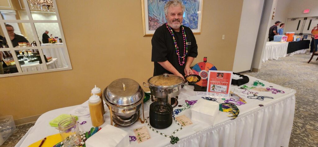 Chef Flannery of Flannery's Bayou & BBQ served Caribbean Jerk Chicken w Honey Mustard and Nawlins Dirty Rice