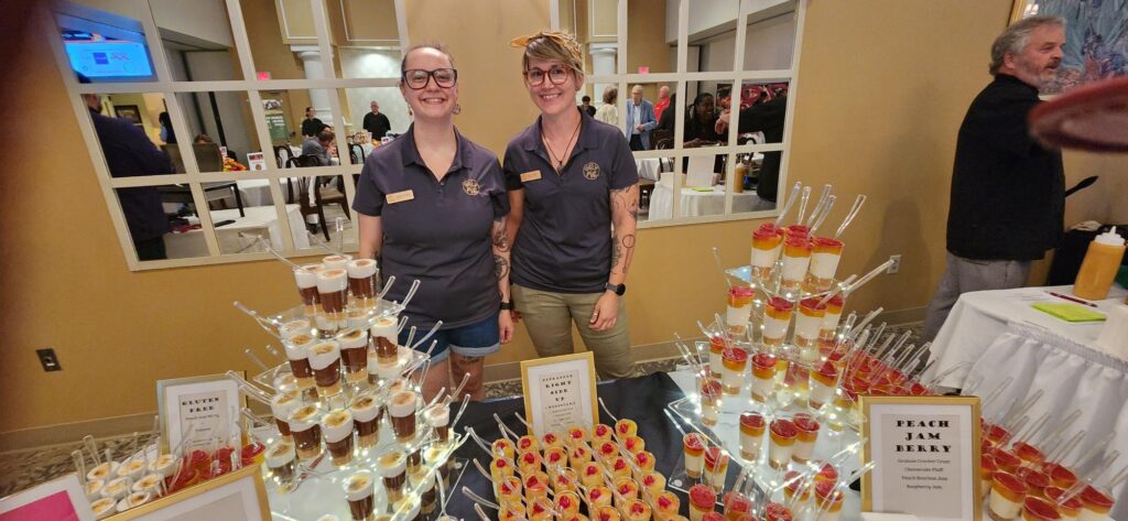 Shaina Bounds and Heather Hall show their wares from The Ugly Pie