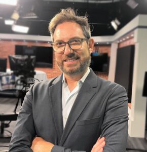 Joe Carmean WMDT A man smiling in a suit