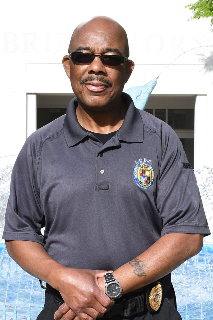 A man smiling for his picture.