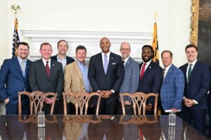 Board-of-public-works-advances-7.5-million group of men smiling