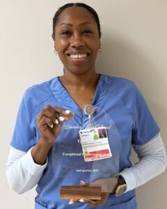 lab legend award woman holding lab legend award