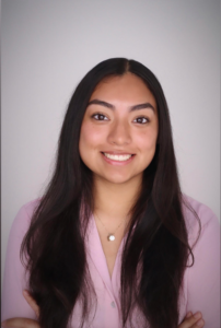 A girl smiling for her portrait