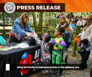 Parents and kids trick or treating.