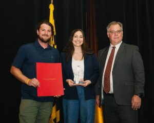 John Hickman, BEACON at Salisbury University presented the New Business of the Year Award to John and Erica Tilghman of Tidal Roots.