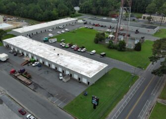 Cox and Spicer-Davis Fully Lease Northwood Business Center