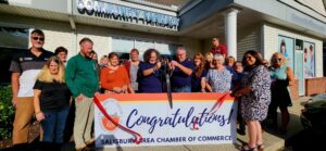 Ribbon cuting at the new location for Community Farmacy
