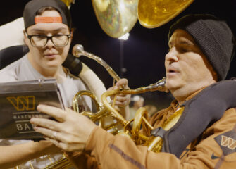 SU Marching Band practices with Washington Commanders Marching Band