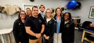 Owners Tim and Dr. Tanya Dickson (center) are joined by their amazing staff!