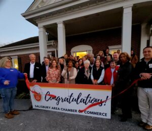 Ribbon cutting celebrating the new clinic for Pregnancy Care Center of the Eastern Shore!