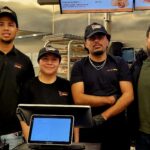 Franchise owner Moe Ramadan (far right) with his incredible staff at Crimson Coward