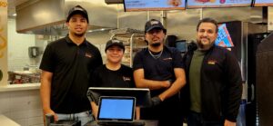 Franchise owner Moe Ramadan (far right) with his incredible staff at Crimson Coward