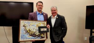 President CEO Bill Chambers thanks outgoing SACC Chairman of the Board Zach Evans, Mountaire Farms