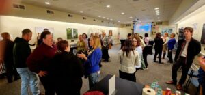 Room full of guests conversing