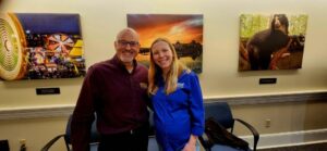 Two guests smiling for a photo