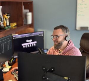 A man working on the computer.