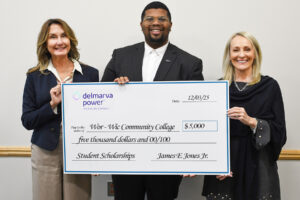 Delmarva Power Donation | Wor-Wic 3 people holding a large donation check.