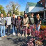 group-smiling-outside group-smiling-outside