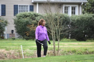 woman-walking-on-course